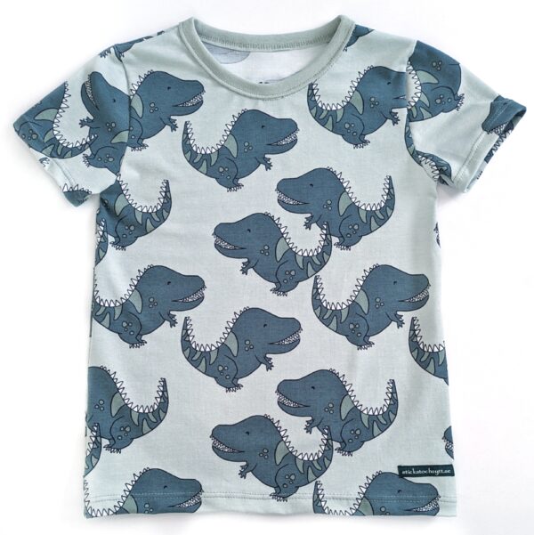 Kortärmad t-shirt med dinosaurier på ljusgrönt
