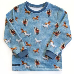 T-shirt med hästar stl 98