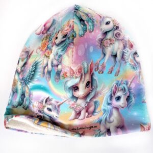 Fleecefodrad mössa med enhörningar i pastellfärger