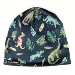 mössa med dinosaurier på mörkgrönt