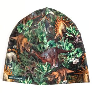 Mössa med dinosaurier på grönt